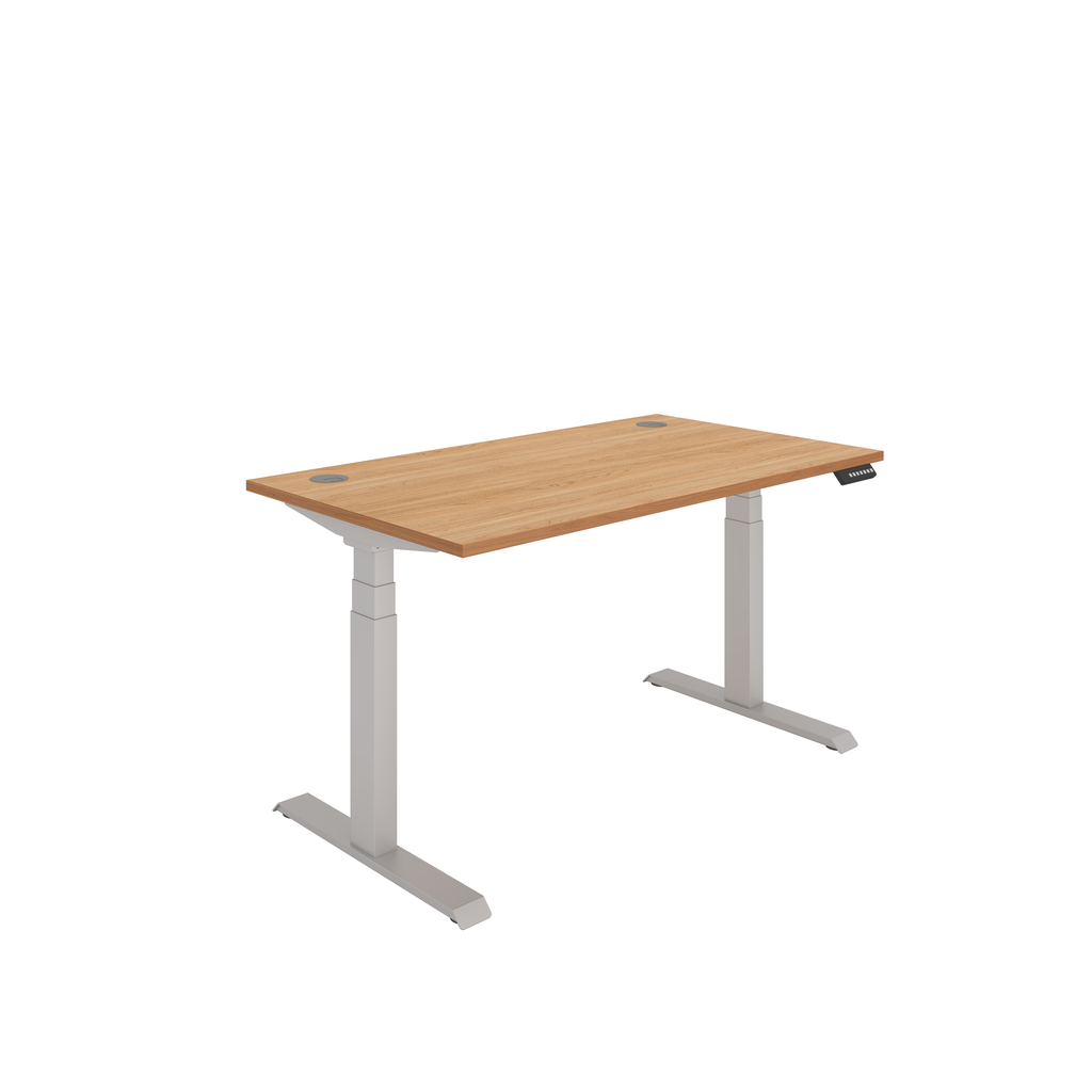 Dual Motor Sit Stand Desk -height adjustable workstation with cable ports and digital control panel. Beech top with silver frame.