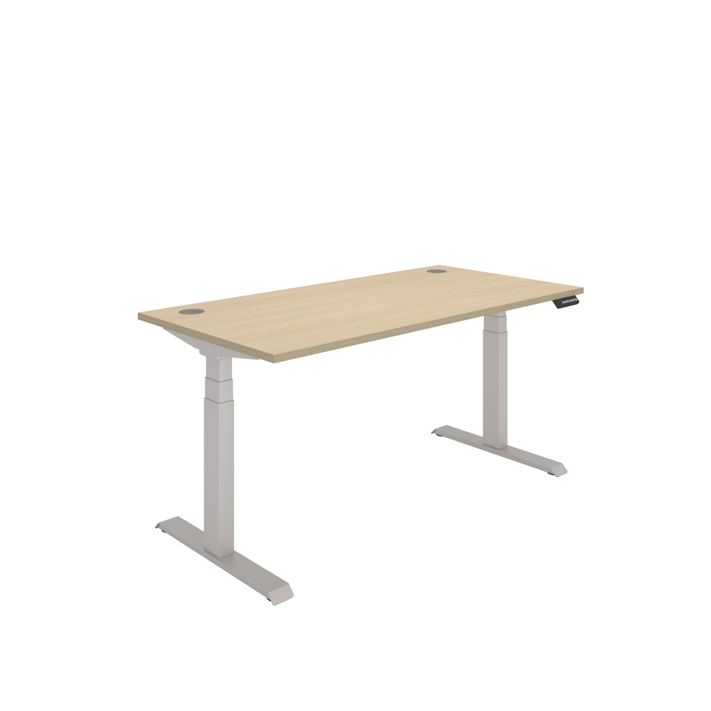 Dual motor sit-stand desk suitable for a modern office setup with ergonomic design. Oak top with Silver Frame.