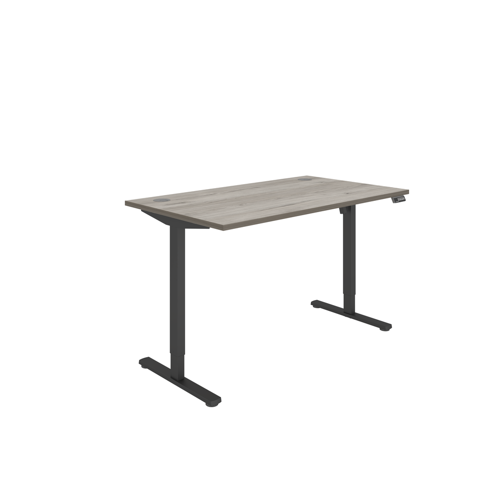 Single Motor height adjustable desk with grey oak top and black frame, with electricity powered control panel.