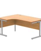 Beech double upright radial desk with silver frame and cable ports.