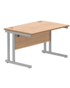 Cantilever frame, double upright rectangular desk with a beech top and silver frame. Includes matching modesty panel and cable ports.