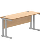 Double upright rectangular office desk with modesty panel and cable ports. Finished with a beech top and silver frame.