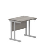 Double upright rectangular desk with cantilever frame and cable ports. Grey MFC top and Silver frame.