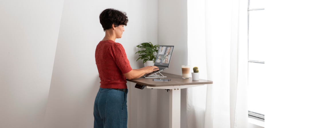 women using her standing desk