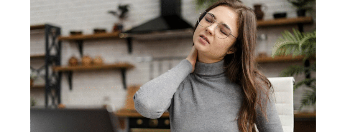 women stretching her neck to reduce strain