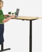 Dual Motor Sit-stand, height adjustable desk. Oak top with a Black frame
